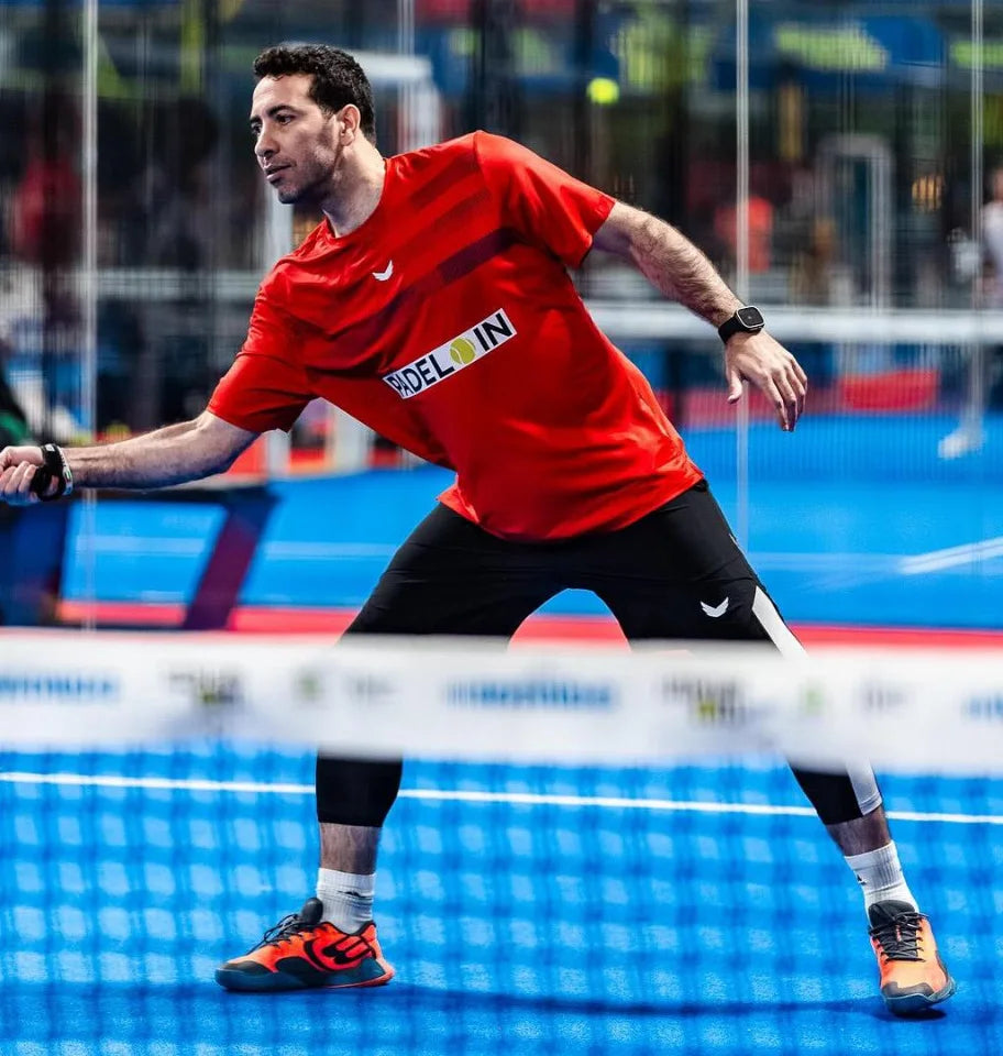 Mohamed Aboutrika playing padel in Wings kit